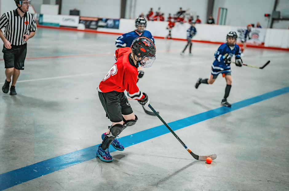 Laken Winsor of the BHPE Mavericks in ball hockey action during a game.