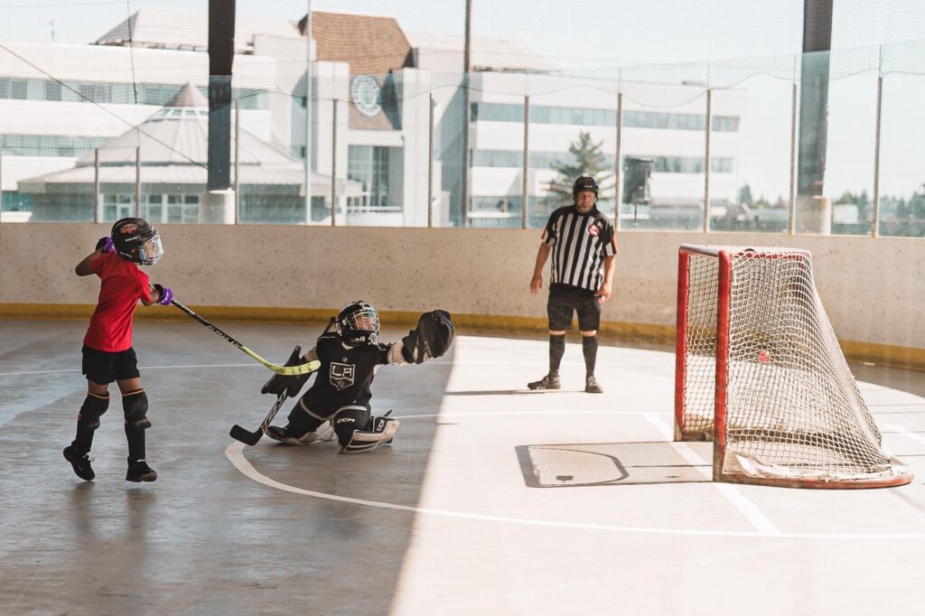 Action shot of the outdoor ball hockey tournament.